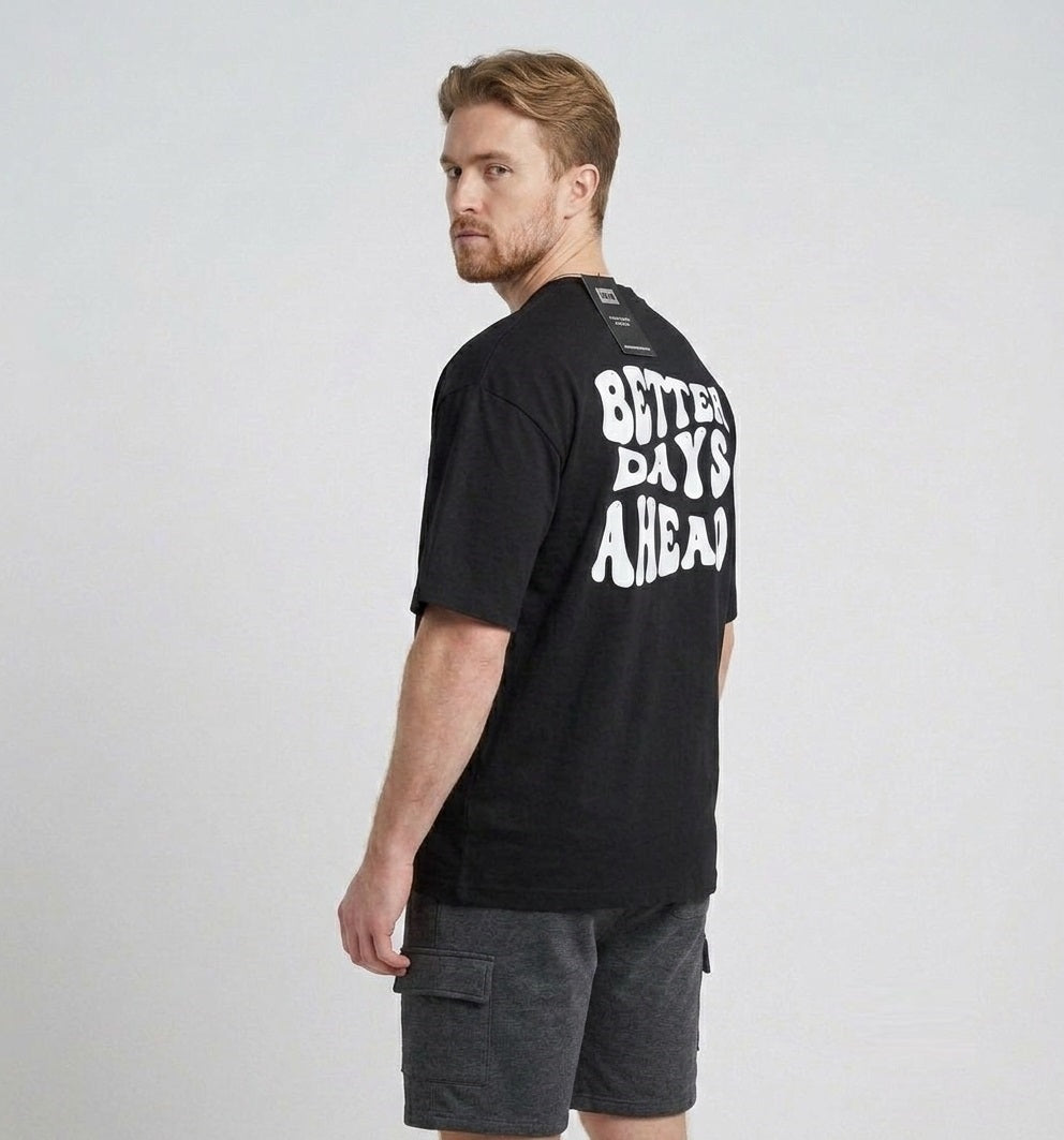 Men's black oversized drop shoulder T-shirt featuring Better Days Ahead graphic print, premium heavyweight cotton UK streetwear tee.