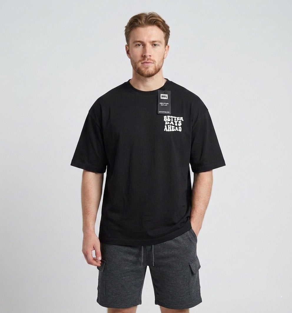 Men's black oversized drop shoulder T-shirt featuring Better Days Ahead graphic print, premium heavyweight cotton UK streetwear tee.