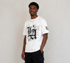 White oversized drop shoulder T-shirt for men featuring bold LA gothic graphic print, UK streetwear fashion style.