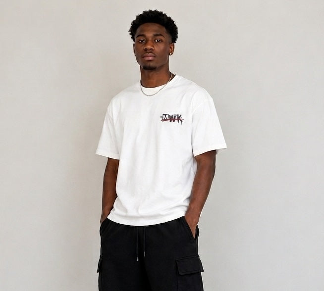 Men's White oversized T-shirt featuring a bold "Making Wrong Kool" graffiti-inspired graphic print on the back with spray paint details.
