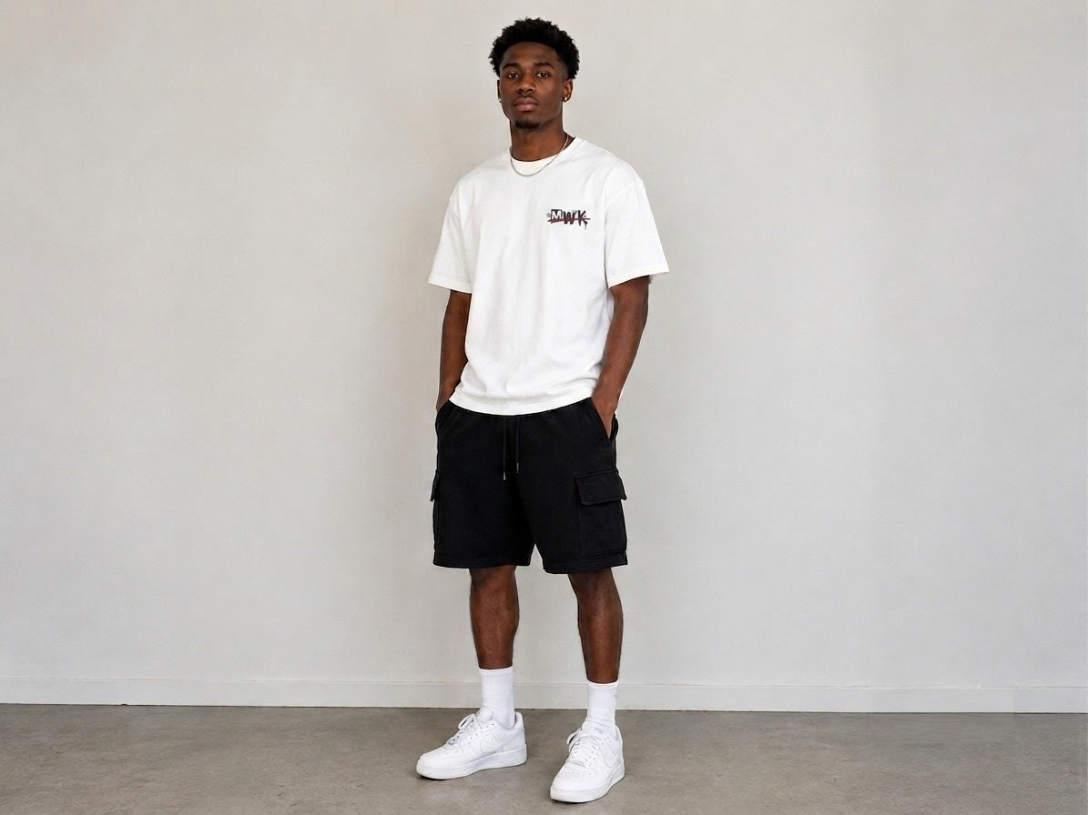 Men's White oversized T-shirt featuring a bold "Making Wrong Kool" graffiti-inspired graphic print on the back with spray paint details.