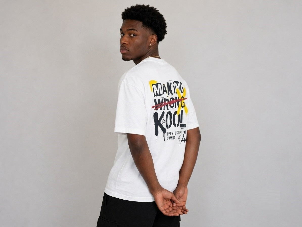 Men's White oversized T-shirt featuring a bold "Making Wrong Kool" graffiti-inspired graphic print on the back with spray paint details.